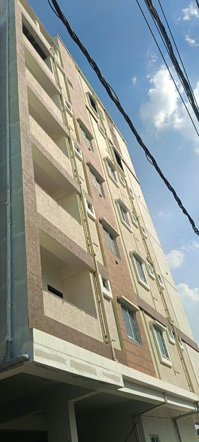 Textured facade finish with balconies